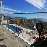 Window clean on a house in halls head with a beautiful ocean view and now clean balustrades