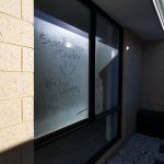 before a window clean and name in dirt