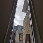 post-construction clean on a large 2 story windows